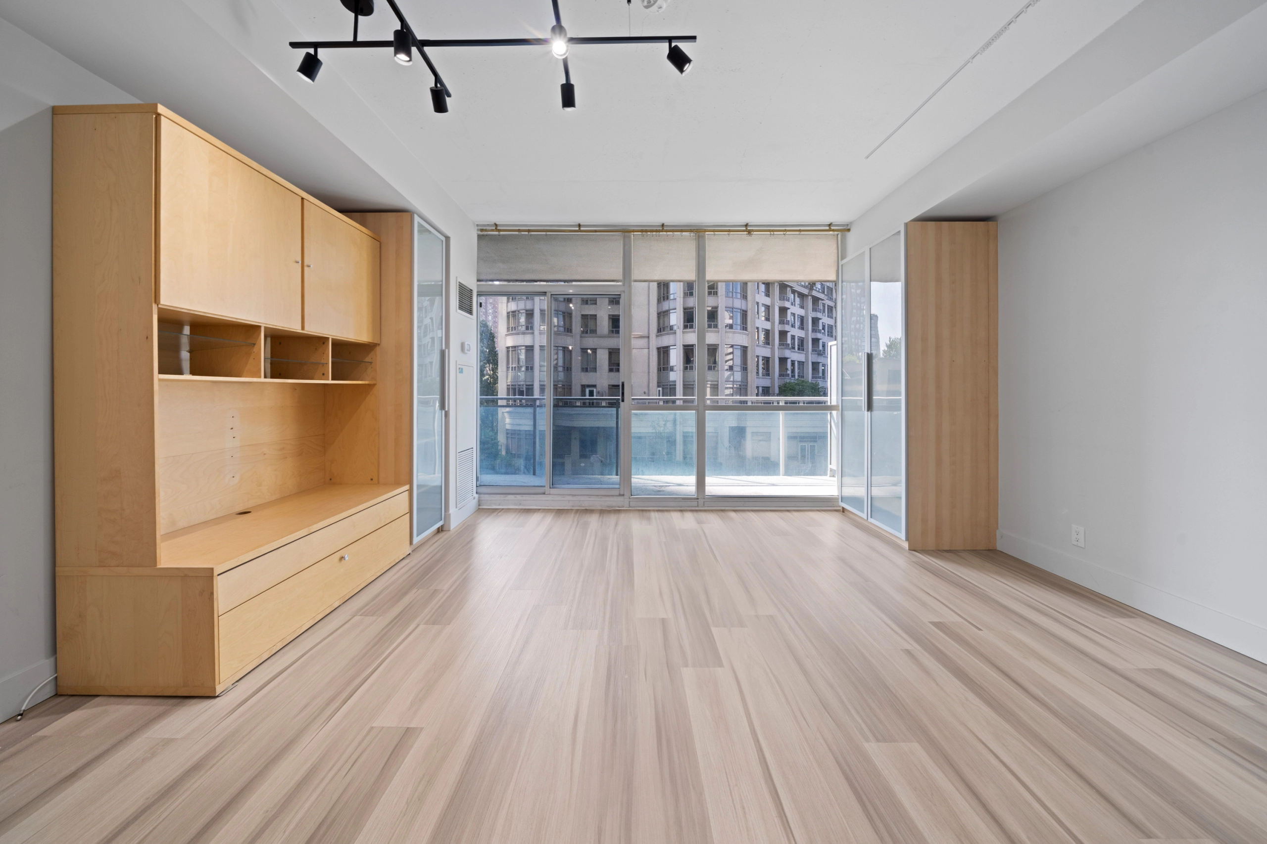 Image of a living room in a condo that is listed for rent in Toronto that requires tenant insurance.