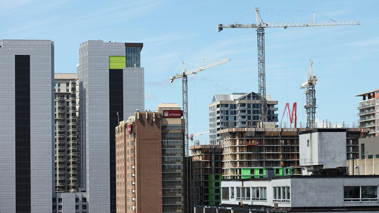 An image overlooking a modern city downtown core.