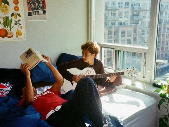 An image of two Toronto room mates in their Toronto condo.